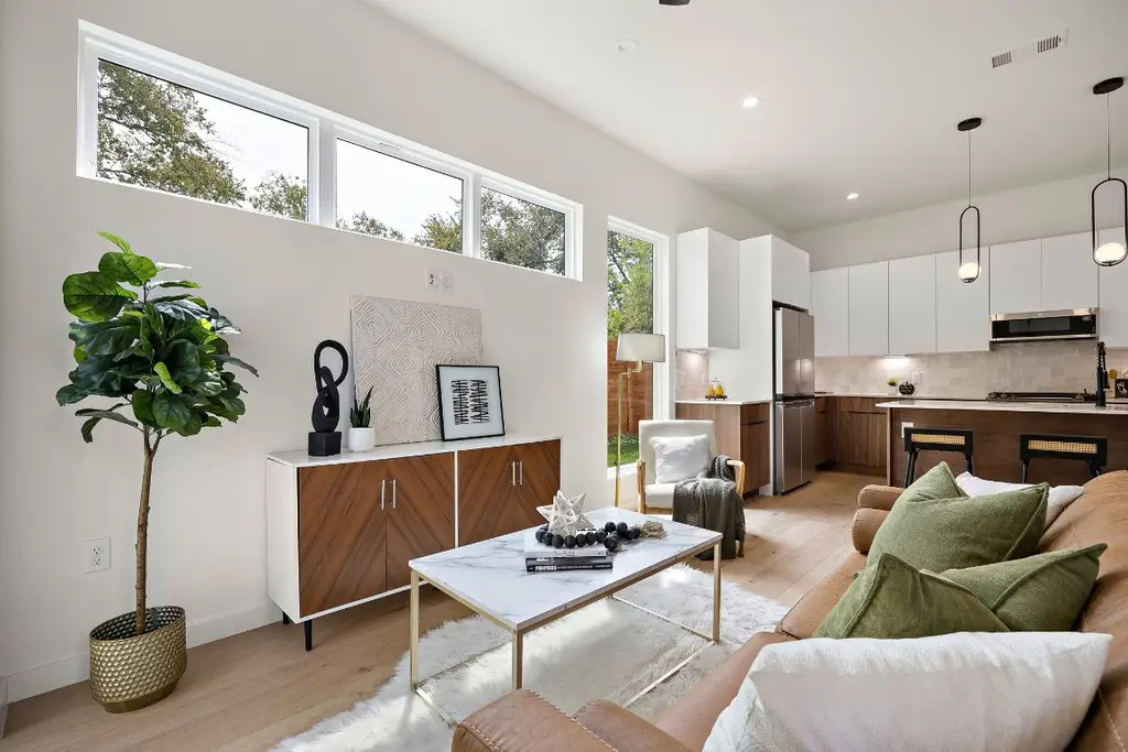 A living room with a couch and a coffee table.