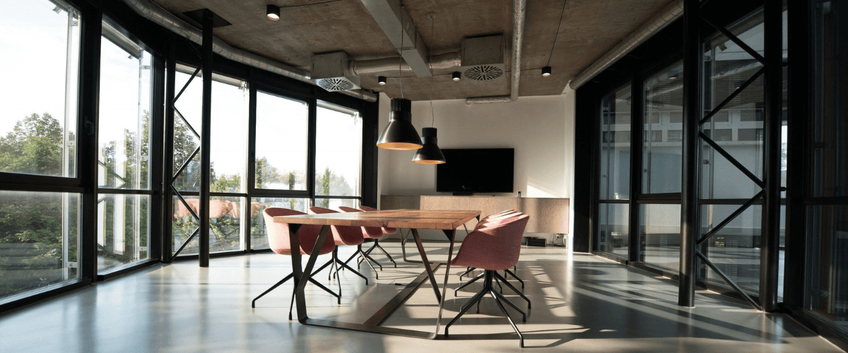 Modern kitchen with wood accents and island.